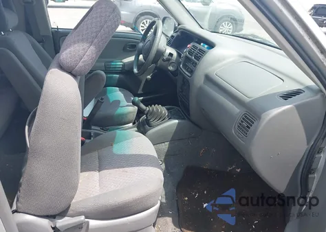 2003 Chevrolet Tracker из США, поврежденный, VIN 2CNBE18C136952611